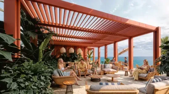 rooftop The rooftop terrace under a terracotta slatted pergola, with residents on daybeds and lounge chairs among planting, the Pacific beyond